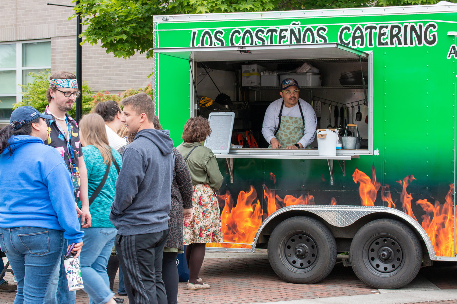 A line forms at the Los Costeños Catering food truck at the Centralia College SpringFest Tuesday afternoon.